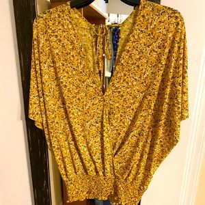 Open back Yellow flowered shirt